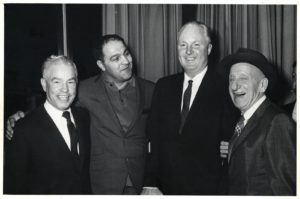  Rocky Marciano (second from left) stands with Former Boston Mayor John Collins and others. Photo via/Boston City Archives