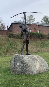 Pumanangwet (He Who Shoots The Stars), a sculpture by Philip Sears at the Fruitlands Museum. Photo/Sandi Barrett