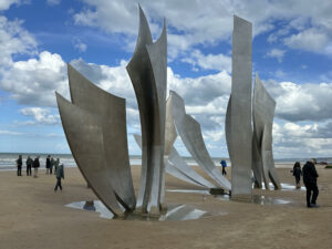 The massive Les Braves Omaha Beach Memorial sculpture honors the military personnel who stormed the beach on D-Day.Photo/Sandi Barrett