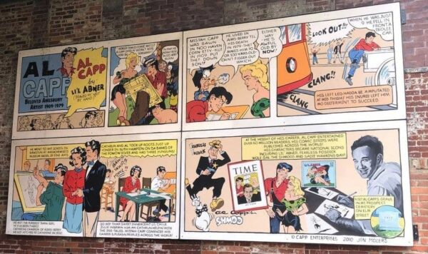 A mural in Amesbury honors the work of “Li’l Abner” cartoonist Al Capp, who once lived and worked in the town.