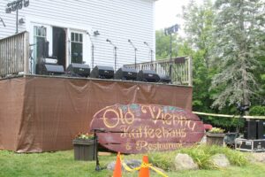 The Old Vienna Kaffeehaus – all 350 pounds of it – fronts the stage during a reunion/revival on Saturday, Aug. 17, at a private residence in Hopkinton.