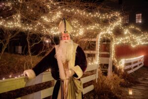 Costumed docents during holiday weekends at Strawbery Banke Museum in Portsmouth, New Hampshire greet guests and regale them with stories of Christmas past.Photo/Courtesy of the Strawbery Banke Museum 