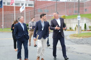 Sheriff Peter J. Koutoujian, right, leads state legislators on a tour of the Middlesex Jail and House of Correction in Billerica.