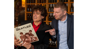 A mutual love for and extensive knowledge of The Beatles brought DJ Cha-Chi Loprete and magician John Logan together to entertain fans of the Fab Four.Photo/Leo Gozbekian 